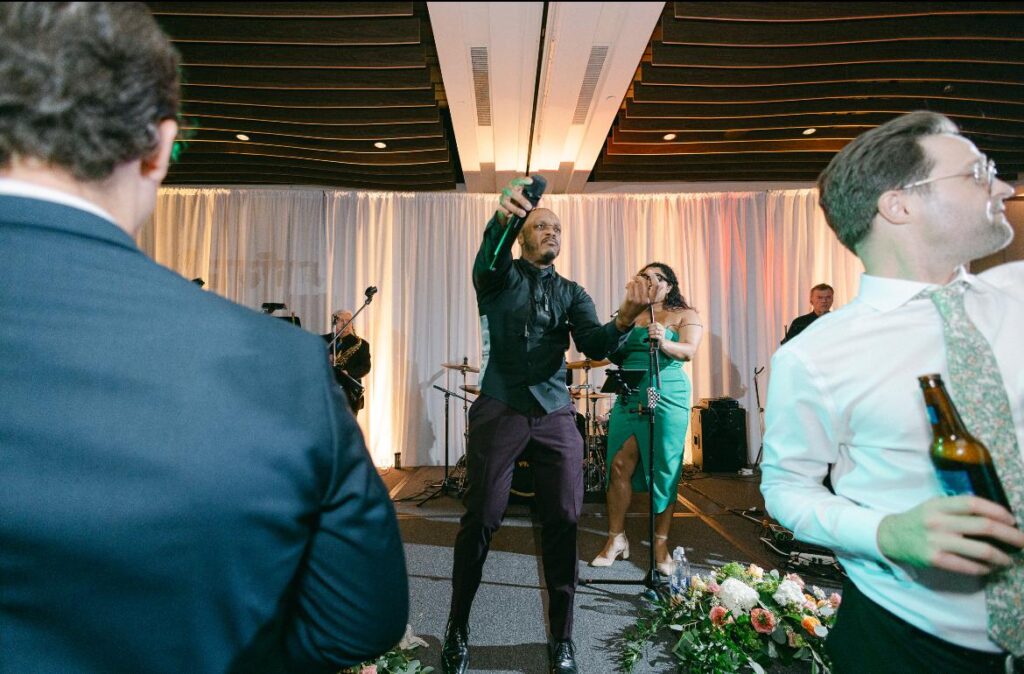 Vocalist singing at Newport reception